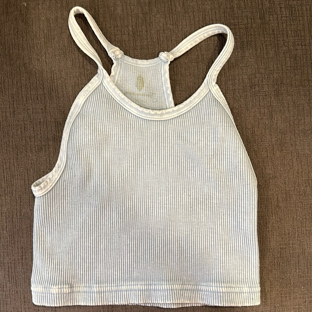 Light blue distressed free people tank top. Size small.